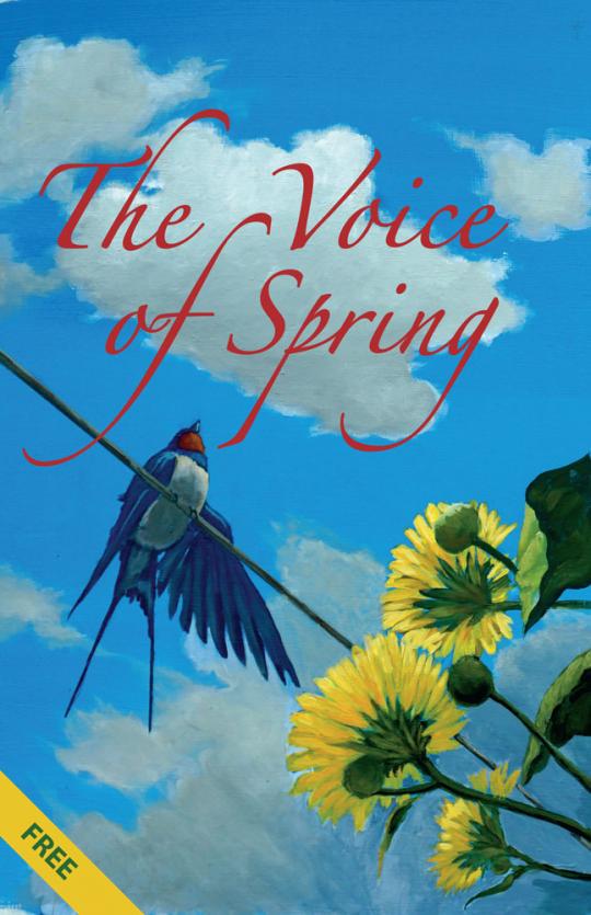 Blue bird singing in a budding branch on a beautiful spring day.