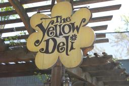 Yellow deli vista sign
